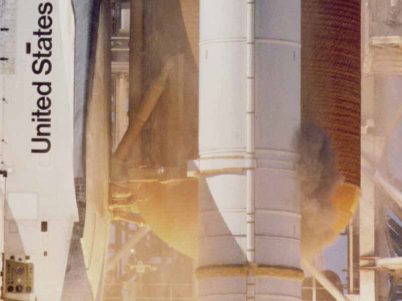 Gas leak on Space Shuttle Challenger. Public Domain, retrieved from https://en.wikipedia.org/wiki/Space_Shuttle_Challenger_disaster#/media/File:STS-51-L_grey_smoke_on_SRB.jpg